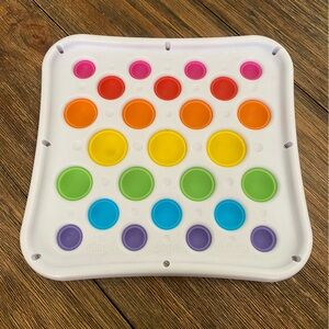 Rainbow colored Dimpl Pops Deluxe Toy